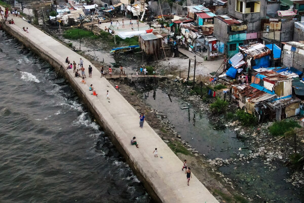 A seawall construction in low-lying metropolitan Manila, Philippines. Many developing countries lack the resources to prepare for the more serious climate-related threats still to come.
