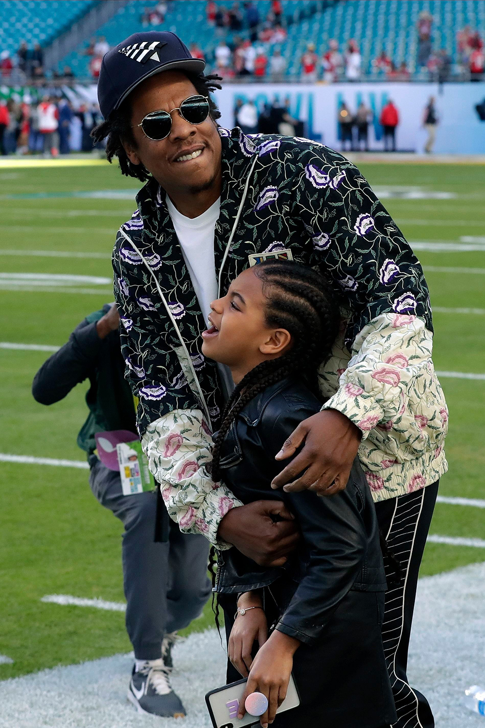 Entertainer Jay-Z embraces his daughter Blue Ivy Carter as they arrive for the NFL Super Bowl 54 football game between the San Francisco 49ers and the Kansas City Chiefs, in Miami
49ers Chiefs Super Bowl Football, Miami Gardens, USA - 02 Feb 2020