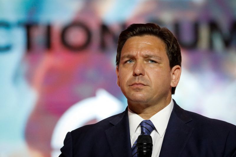 U.S. Florida Gov. Ron DeSantis pauses as he speaks on stage at the Turning Point USA's (TPUSA) Student Action Summit (SAS) in Tampa, Florida, U.S., July 22, 2022. REUTERS/Marco Bello