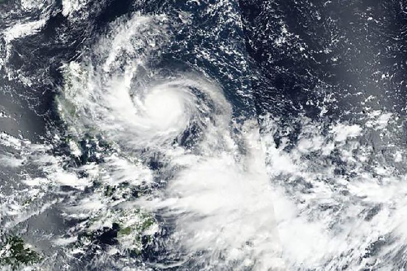 A satellite image from Saturday released by NASA  shows Typhoon Noru approaching the Philippines.
