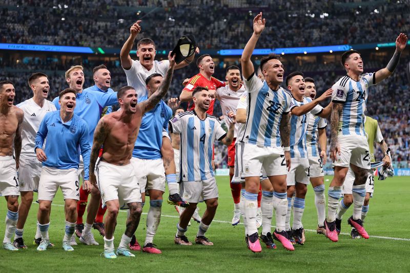 Argentina players celebrate after winning the penalty shootout against the Netherlands.